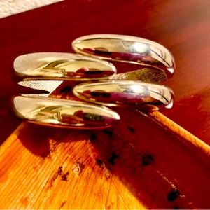 Modern large polished silver cuff bracelet with hinged opening. Unique